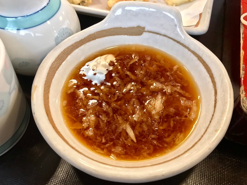Radish stirred into the dipping sauce.