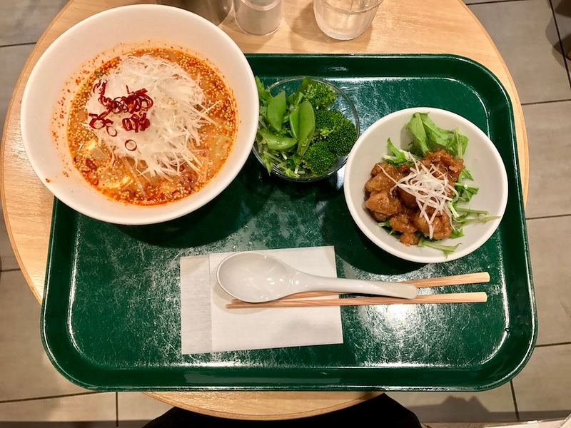Shiro tantan ramen bowl, vegetable toppings and deep-fried soy meat. Shiro tantan ramen bowl, vegetable toppings and deep-fried soy meat.