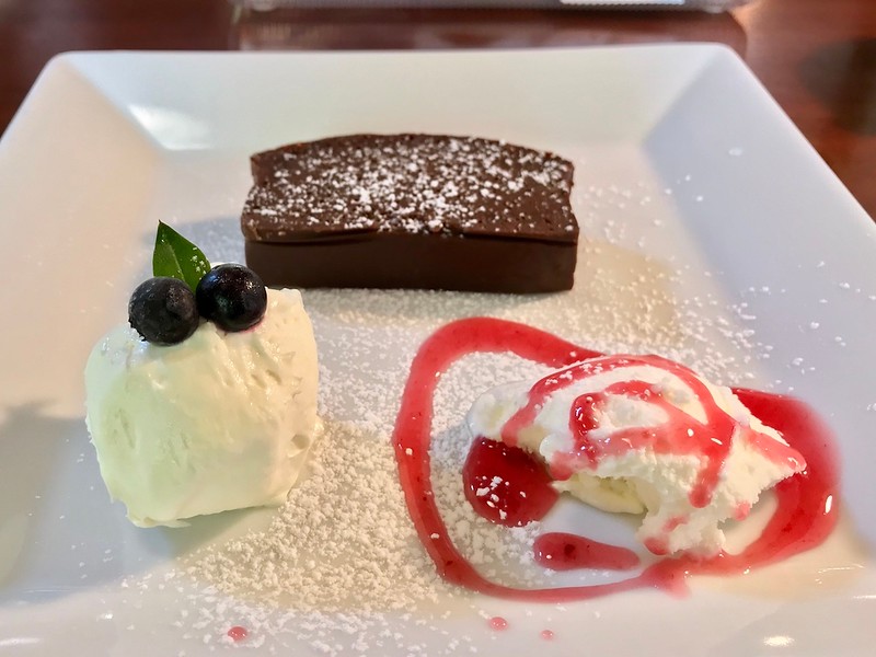 Chocolate gateau, ice cream, and a rich, dense, whipped cream.