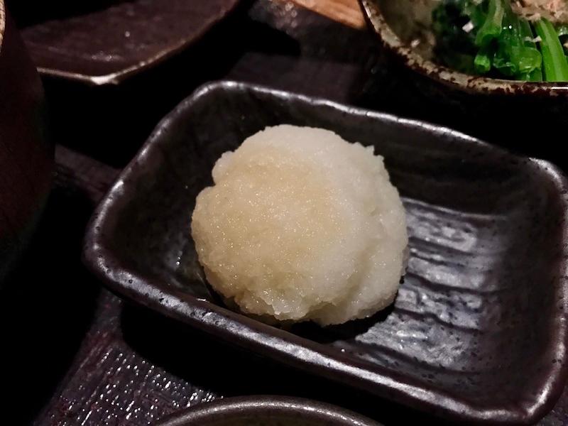 A neat heap of grated daikon.