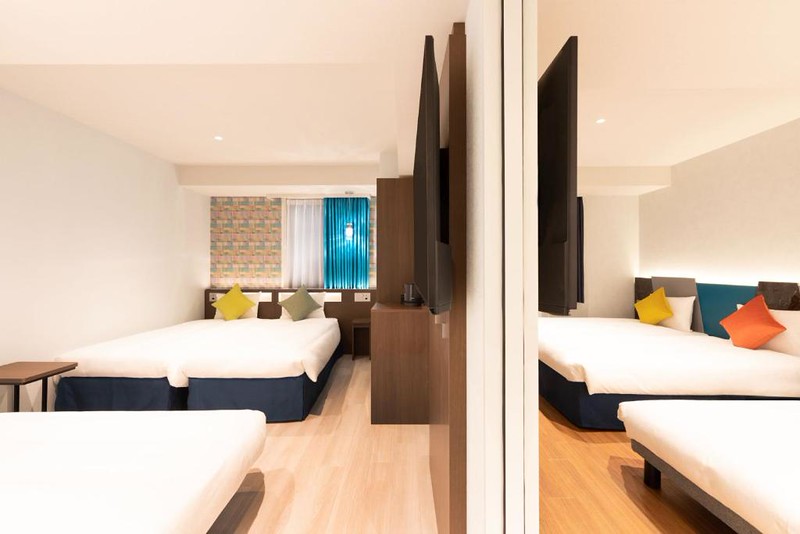 A view through connecting rooms that sleep three in each in the karaksa hotel colors Tokyo Yaesu A view through connecting rooms that sleep three in each in the karaksa hotel colors Tokyo Yaesu