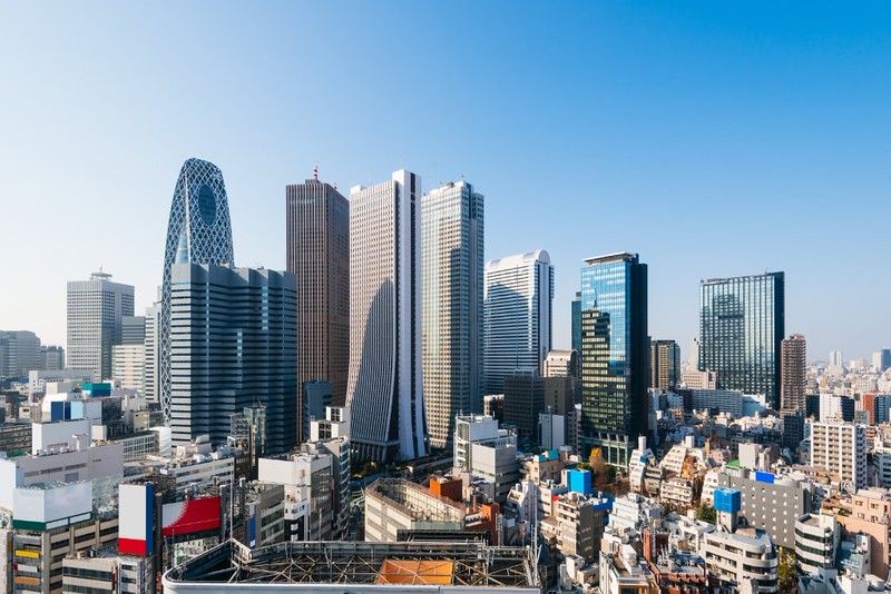 Skyscrapers of the Shinjuku city skyline, Shinjuku, Tokyo, Japan, on a bright, blue day