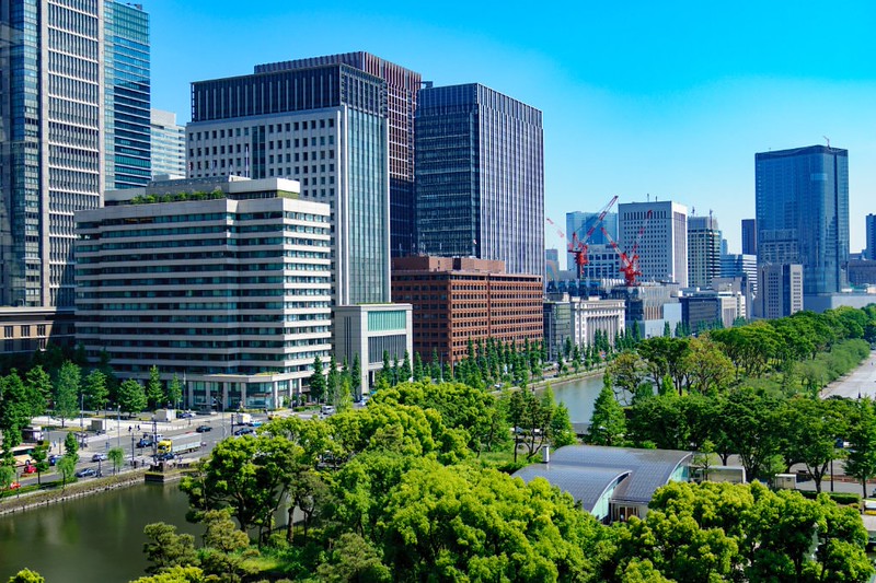 Bankside buildings alongside the water in the Ohtemachi district of Tokyo on a sunny day Bankside buildings alongside the water in the Ohtemachi district of Tokyo on a sunny day