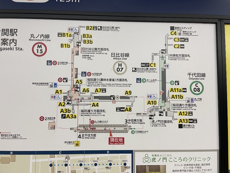 Close up of the schematic map of a train station, with information about exits and other facilities, typically seen on the platform of a Tokyo subway station