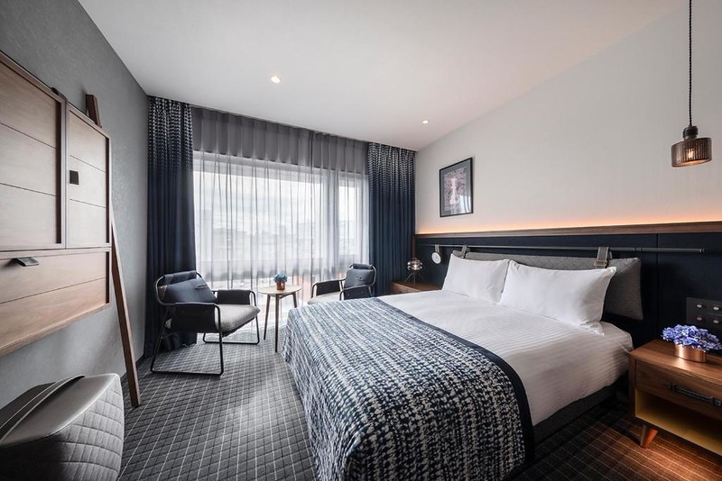 Simple greyscale elegance with touches of natural colour in a double room in The Lively Tokyo Azabujuban hotel