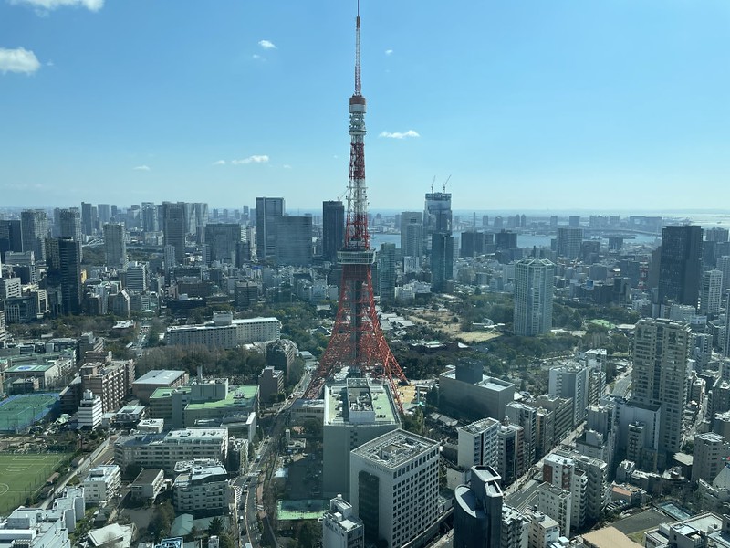 A view over the Tokyo Tower and other buildings from the JP Mori Tower Sky Looby in the Azabudai Hills complex, Tokyo, Japan