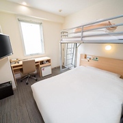 Double bed with overhead single bunk in a Super Hotel Asakusa triple room, Tokyo, Japan