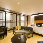 Hotel Ryumeikan Ochanomizu Honten guest room with large twin beds and traditional Japanese interior stylings