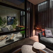 A range of different seating options in the atmospherically lit lobby of The Lively Azabujuban hotel in Tokyo