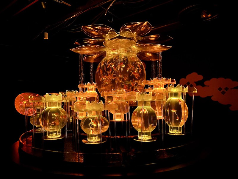 Oranately-shaped orange tanks containing goldfish in the Art Aquarium in Mitsukoshi Ginza, Tokyo