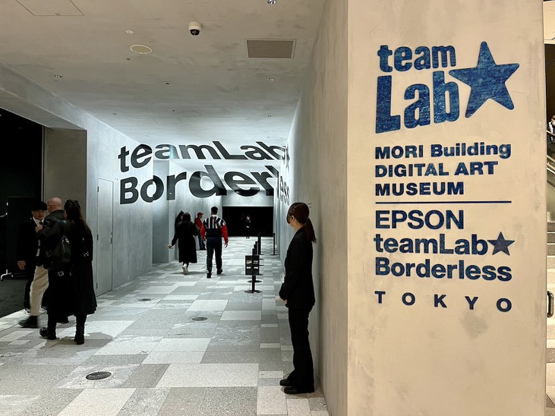 The entrance hallway and signage to teamLab Borderless