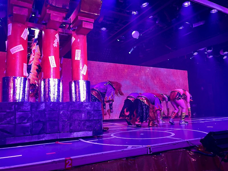 On-stage dancers at Samurai Restaurant Time pulling a traditional Japanese shrine