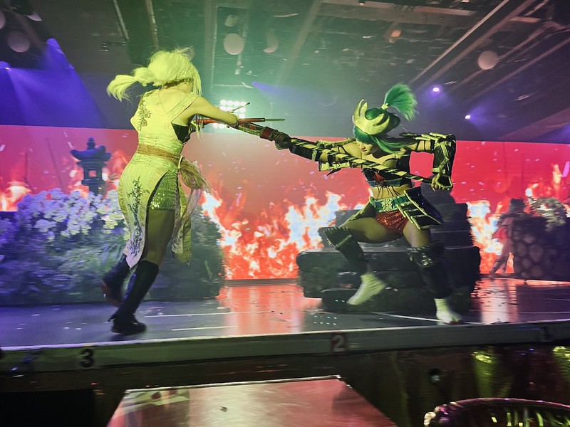 Characters on stage at Samurai Restaurant Time fight one another