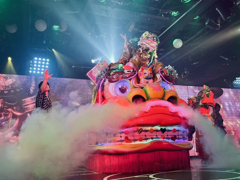 A float of a lion with cute mouth braces and dry ice issuing from its nostrils at Samurai Restaurant Time